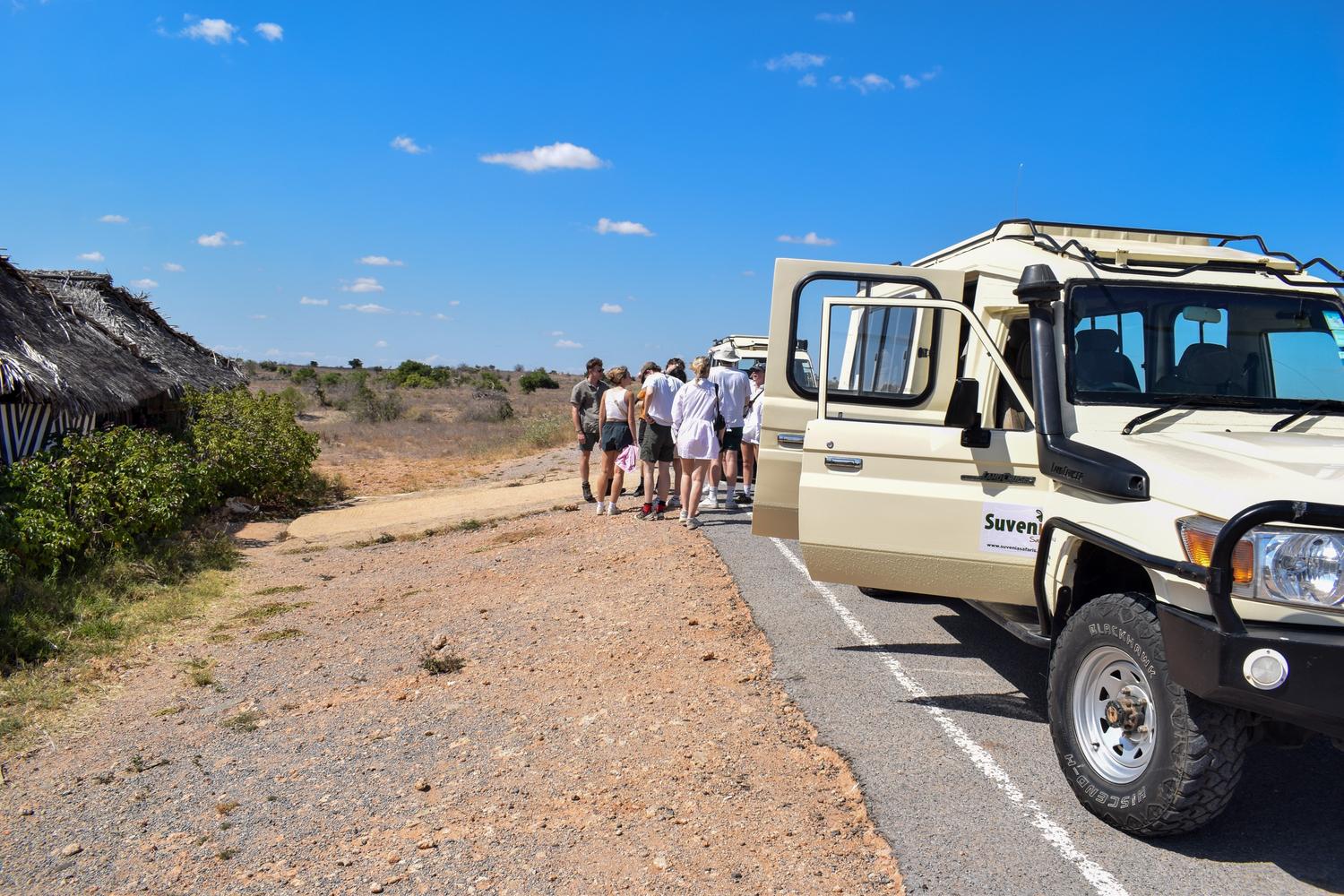 Suvenia Safaris guests on a wildlife game drive in East Africa